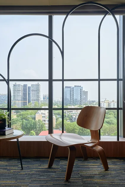 Arched window seating overlooking the Ahmedabad skyline