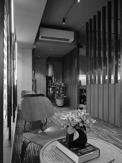 Corridor with timber slat partitions leading to the pantry