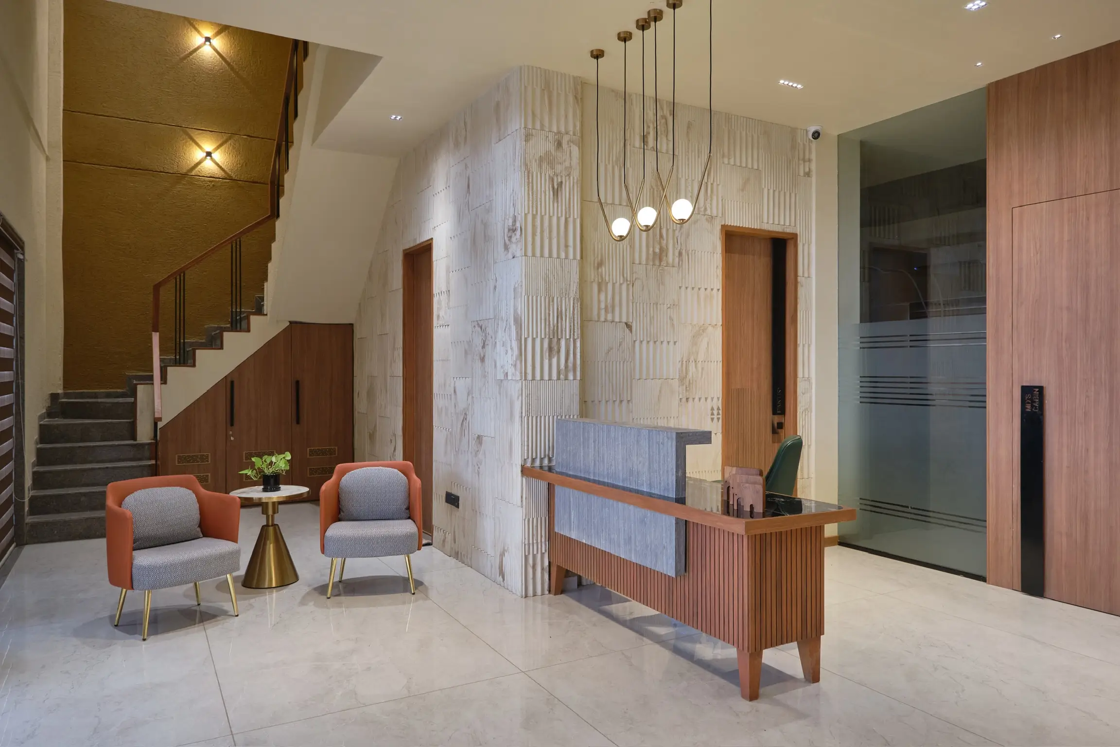 A luxurious AMK-designed living space — warm tones, bespoke furniture, and curated lighting