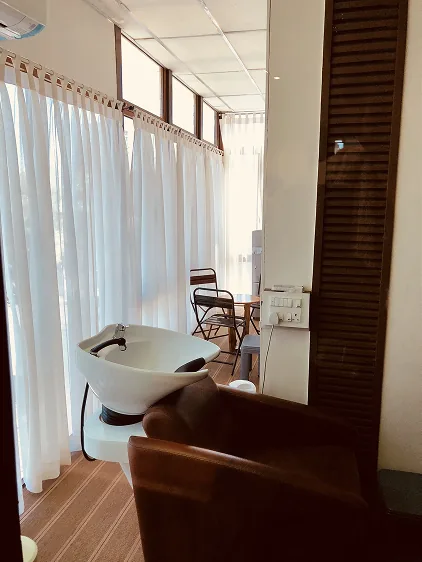 Backwash lounge with sheer curtains and daylight