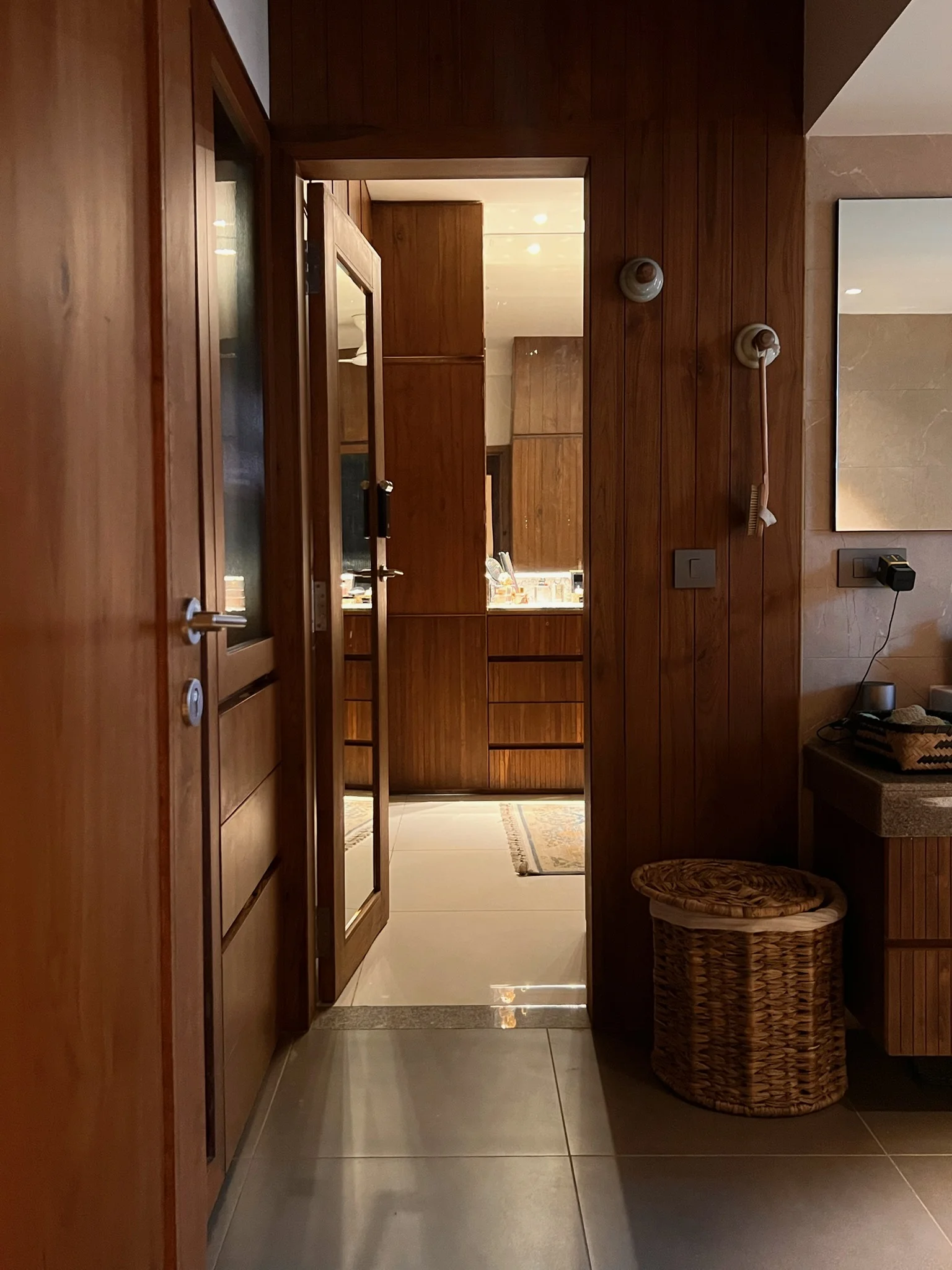 Bathroom entrance with wood paneling
