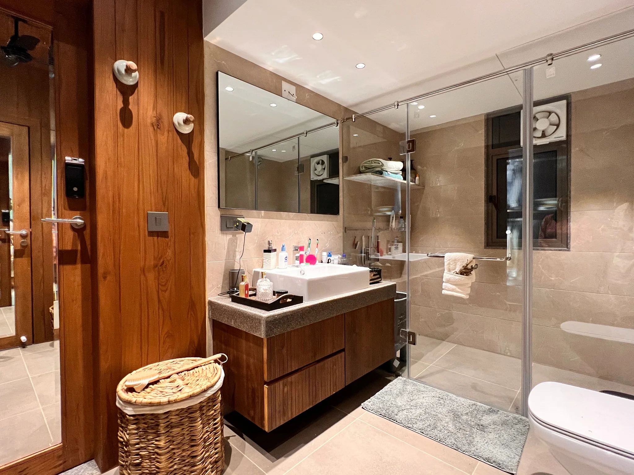 Bathroom with vanity and glass shower