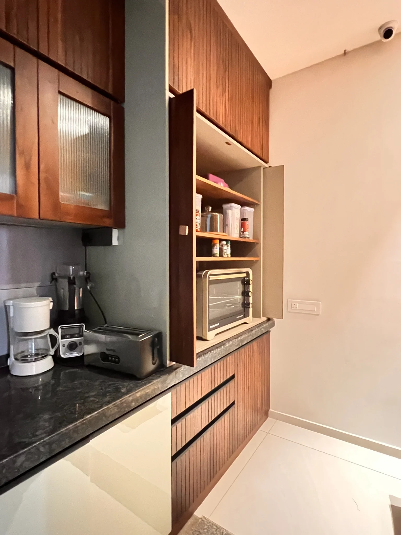 Kitchen tall unit with coffee maker and oven