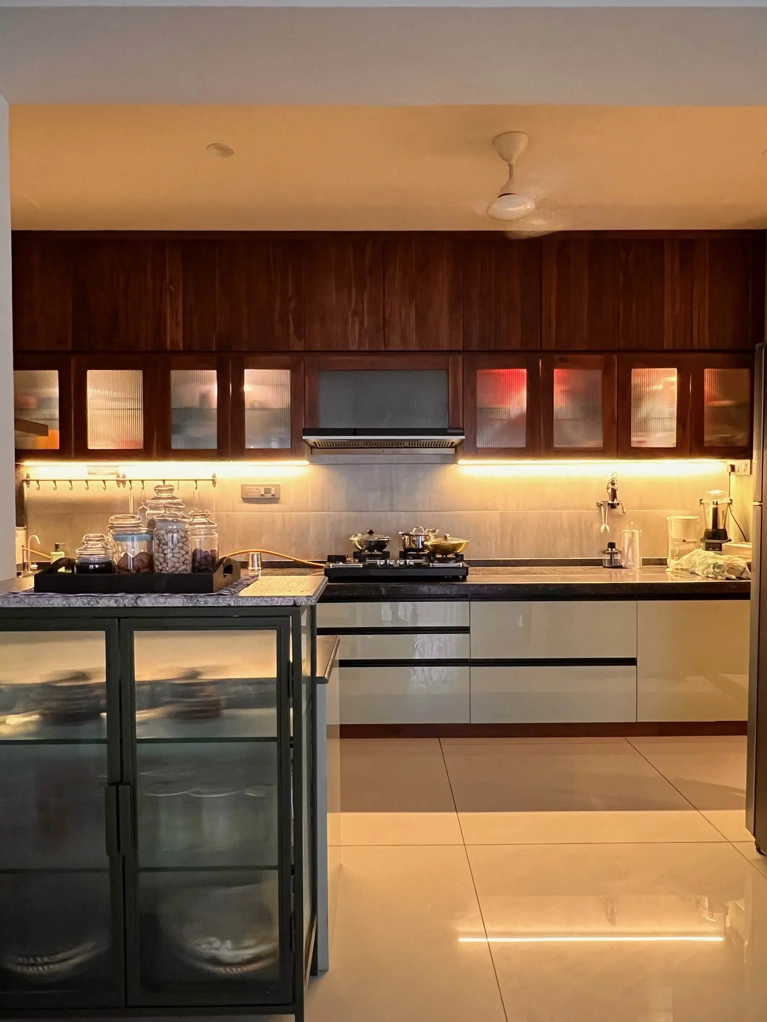 Modular kitchen with glass display cabinet