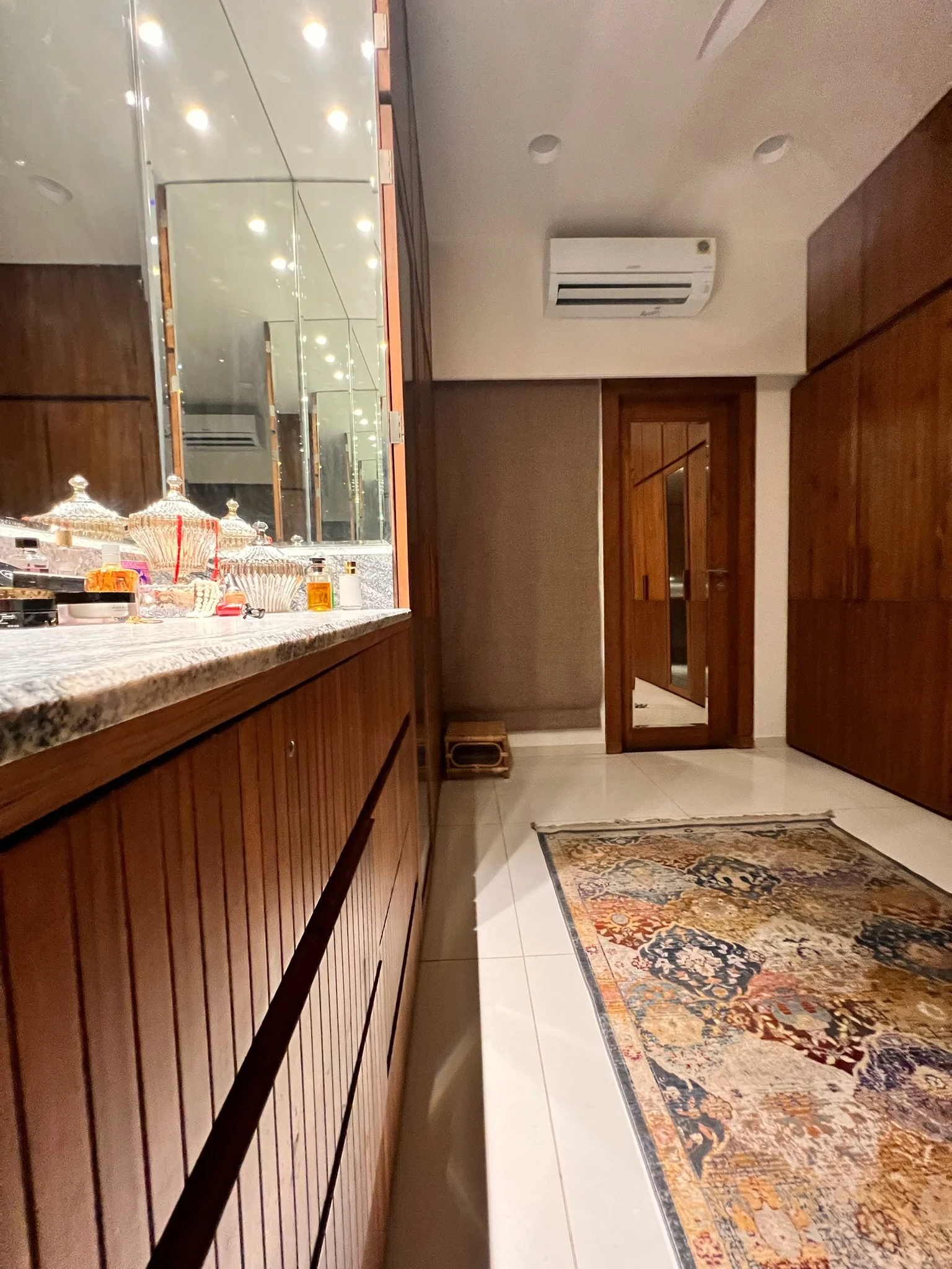 Walk-in dressing area with vanity