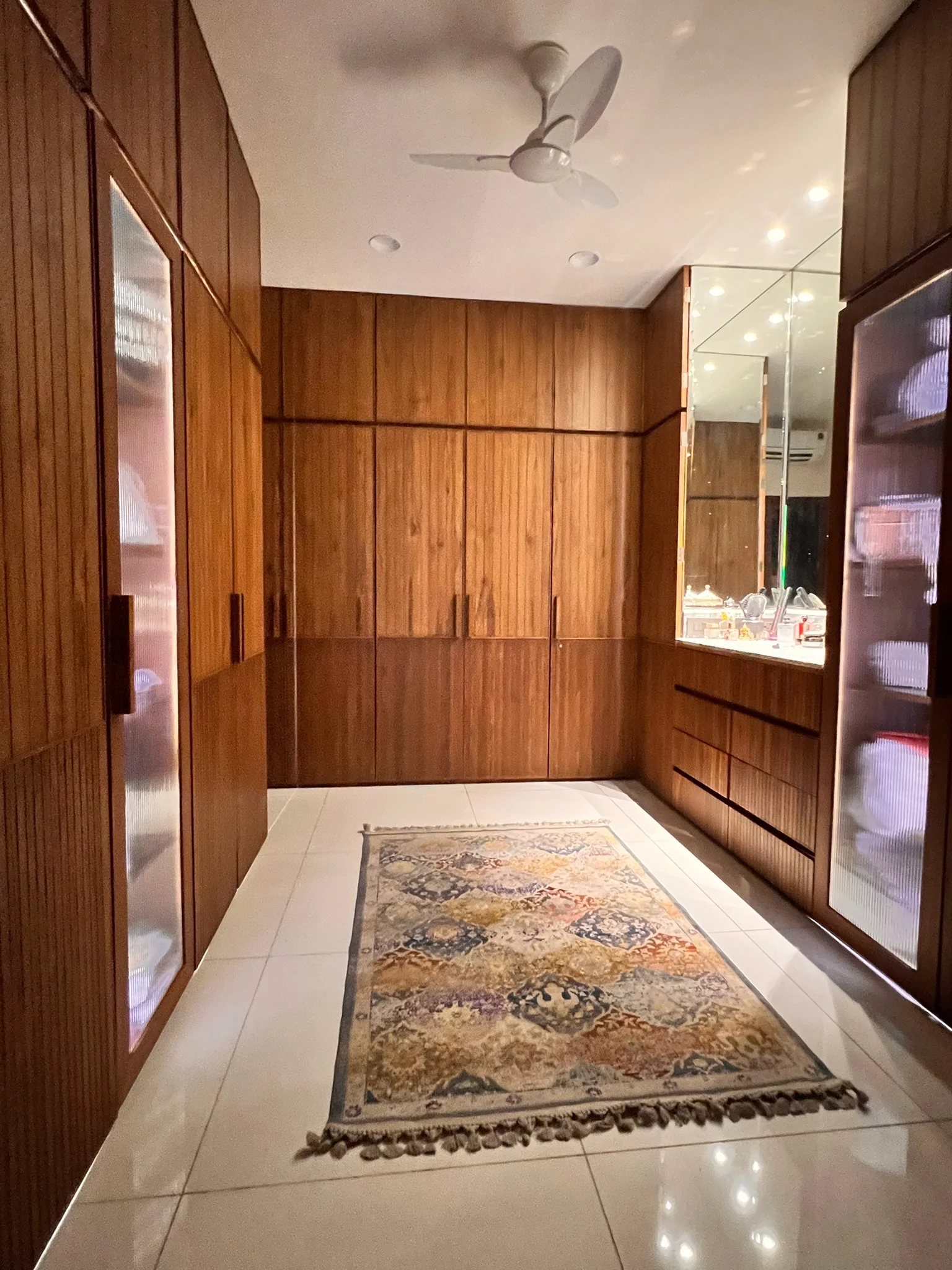 Walk-in wardrobe with rug